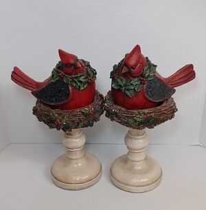 Red Cardinal Figurines Sitting Atop Festive Twig, Holly And Berry Nest Pedestals